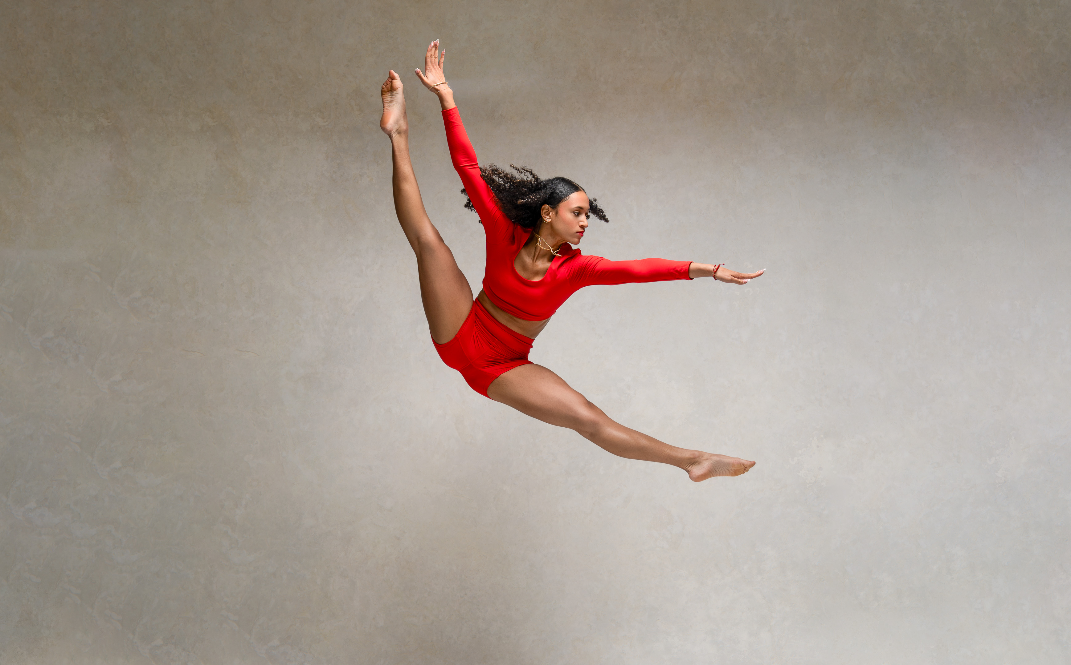 Dance leap in red